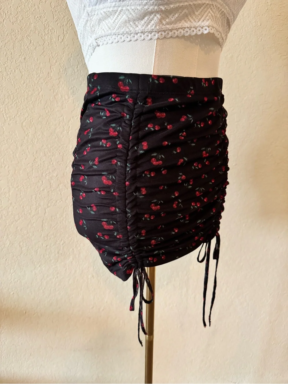 Black Cherry Ruched Mini Skirt Tie Detail Y2K Fruit Print Size M Ruffle Flair